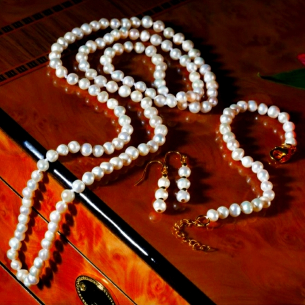 Beautiful pearl earrings, necklace, and bracelet